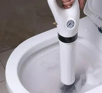 Plunge Blaster power toilet plunger unclogging a toilet