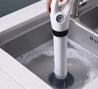 Plunge Blaster air plunger unclogging a sink